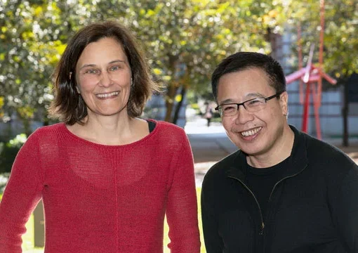 Physicists Silke Bühler-Paschen (left) of Vienna University of Technology and Qimiao Si of Rice University at Rice in November 2021. (Photo by Tommy LaVergne/Rice University)