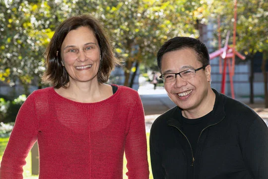 Physicists Silke Bühler-Paschen (left) of Vienna University of Technology and Qimiao Si of Rice University at Rice in November 2021. (Photo by Tommy LaVergne/Rice University)