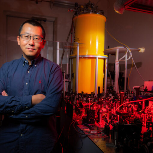 Jigang Wang with his Cryogenic Magneto-Terahertz Scanning Near-field Optical Microscope. (That’s cm-SNOM for short.) The instrument works at extreme scales of space, time and energy. Its performance is a step toward optimizing the superconducting quantum bits that will be at the heart of quantum computing. Larger photo. Photos by Christopher Gannon/Iowa State University.